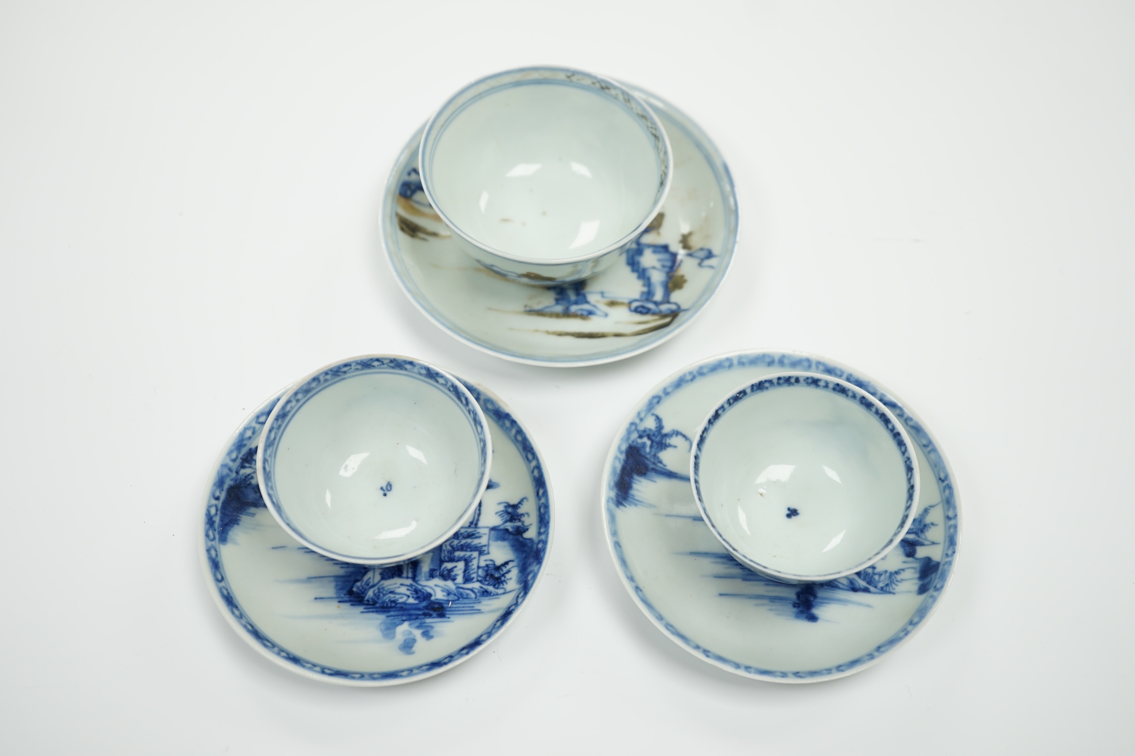 Three Chinese blue and white Nanking Cargo teabowls and saucers, largest 11.5cm diameter